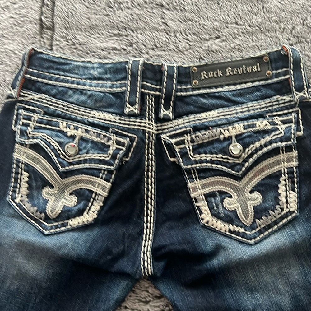 Rock Revival  bootcut size 27 waist,29 inseam , triple stitch, mid rise.